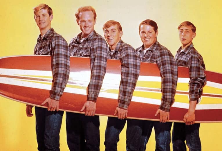 Brian Wilson (front) and The Beach Boys.